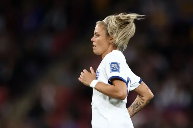 Rachel Daly makes her way onto the field.