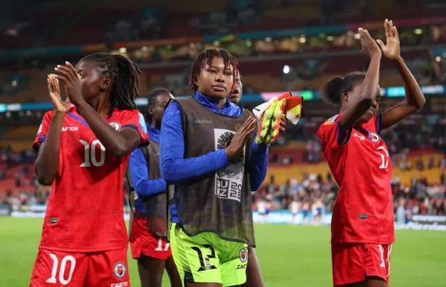 Haiti players thank the fans for their support.