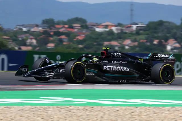 Lewis Hamilton drives his Mercedes F1 car