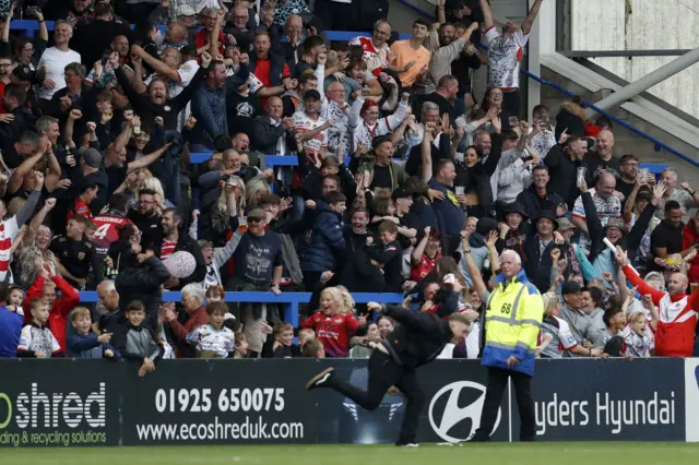 Leigh fans celebrate their side's Challenge Cup semi-final win over St Helens