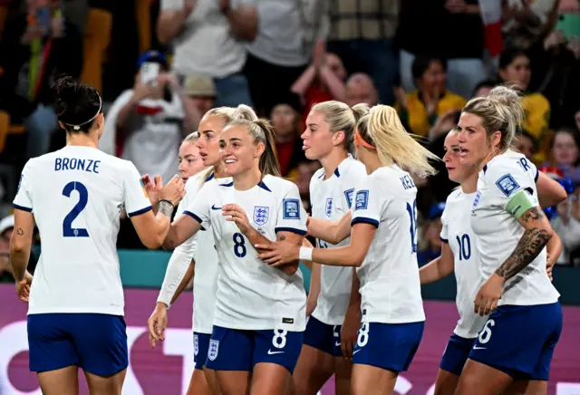 England players congratulate Georgia Stanway after she opens the scoring.