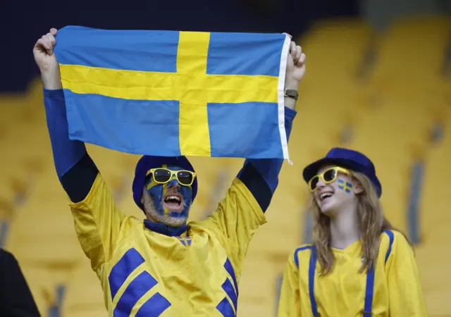 Sweden fans arrive at the stadium for the match with South Africa.