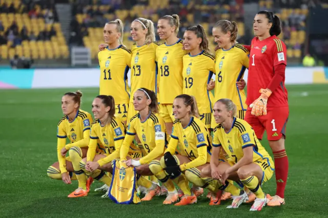 Sweden players pose for the team photo ahead of kick off.