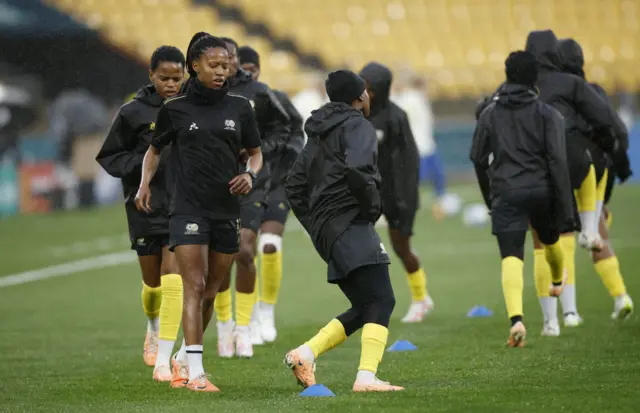 South Africa players begin their warm up.