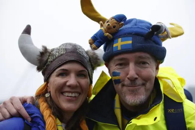 Sweden fans arrive at the stadium for the match with South Africa.