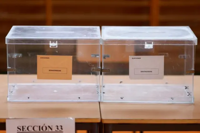 Ballot boxes are set at a polling station in Madrid, Spain, 22 July 2023.