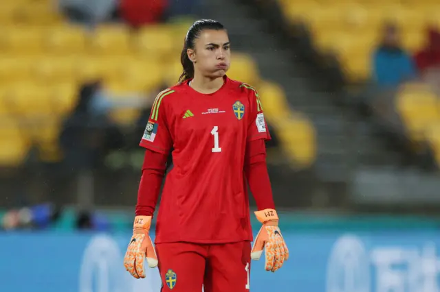 Musovic puffs out her cheeks after nearly being caught out of her goal.