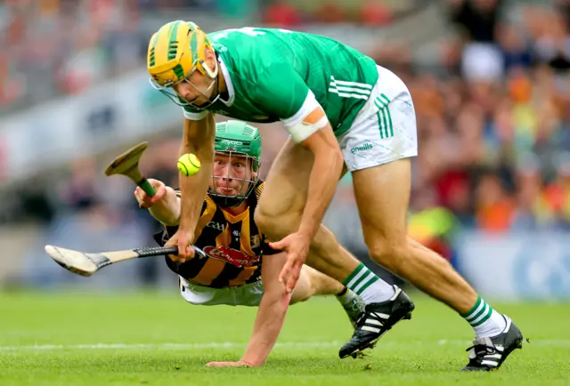 Limerick's Dan Morrissey gets to the ball ahead of Kilkenny's Martin Keoghan