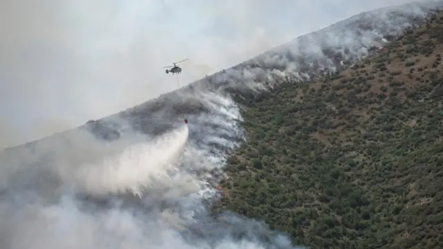 Firefighting aircraft tackle hillside blazes in Corfu