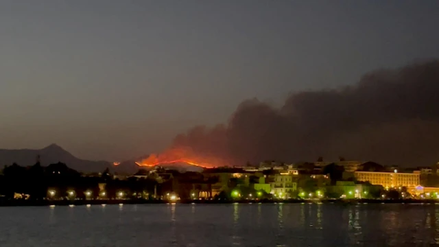 Smoke rising from the island of Corfu on Sunday evening