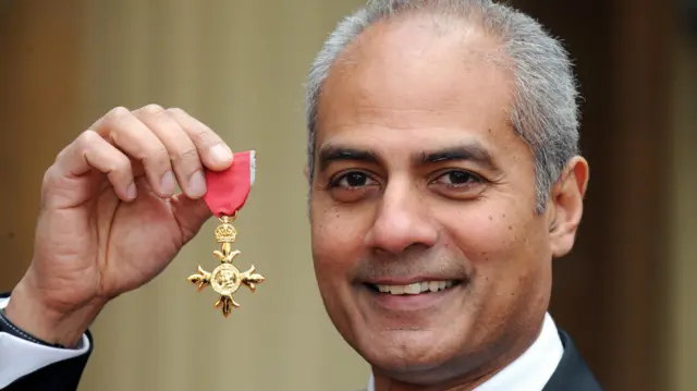 George Alagiah at Buckingham Palace after collecting his OBE from the Queen