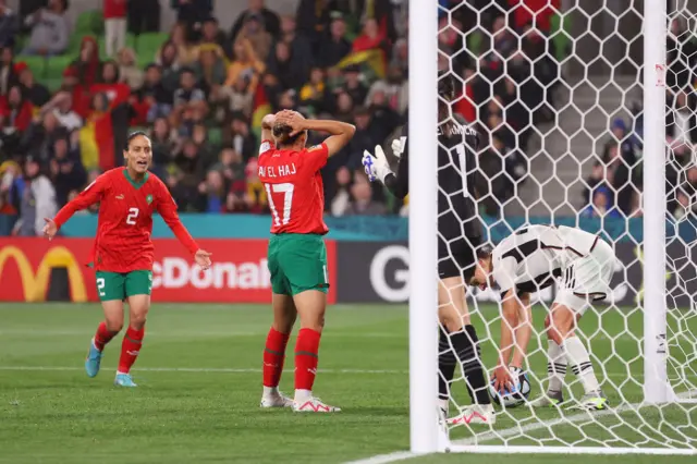 Hanane Ait El Haj puts her hands on her head after scoring an own goal