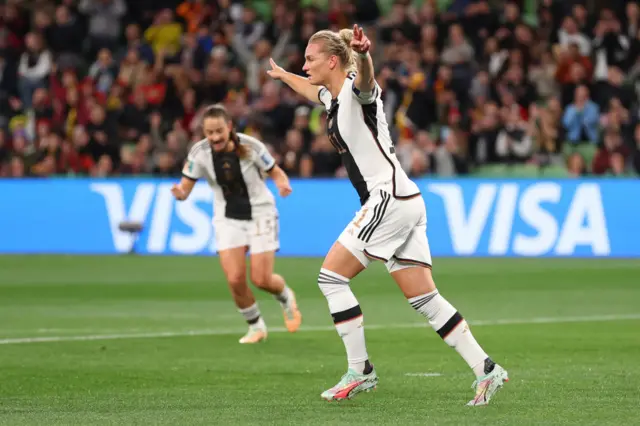 Alexandra Popp celebrates scoring for Germany