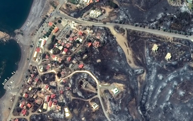 Satellite image shows burned buildings along coastline of Kiotari, Rhodes