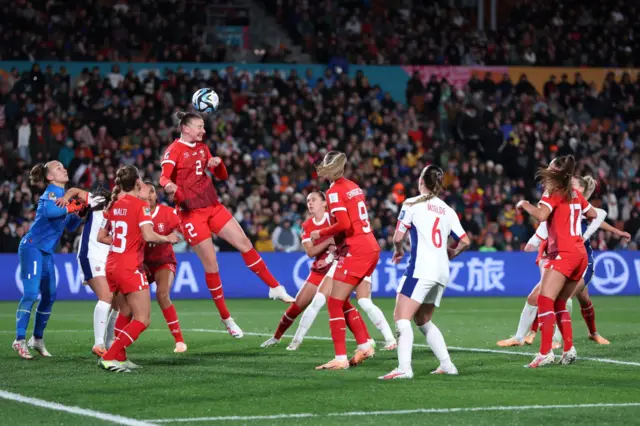 Julia Stierli of Switzerland heads the ball
