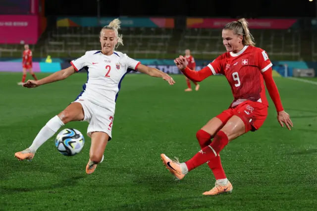 Ana-Maria Crnogorcevic of Switzerland controls the ball against Anja Sonstevold
