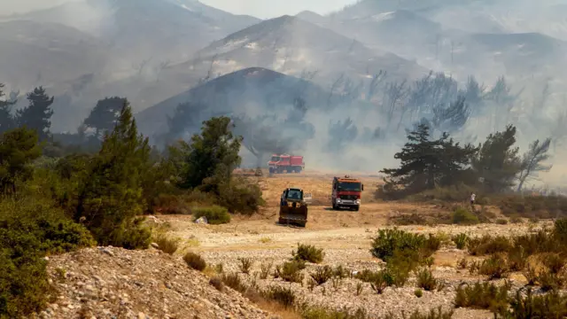 Firefighters have been battling wildfires on Rhodes island in Greece