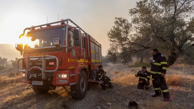 Romanian firefighters take a rest in Rhodes, Greece