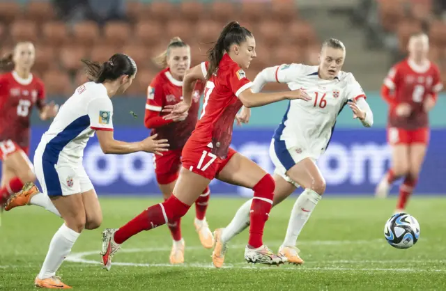 Switzerland's Seraina Piubel runs with the ball
