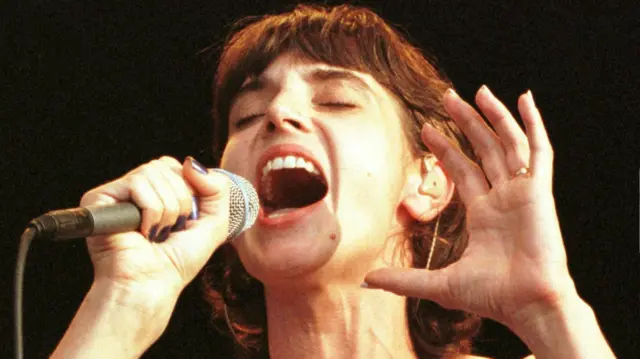 Sinead O'Connor performs at Paleo Festival in Nyon, Switzerland, in 1997