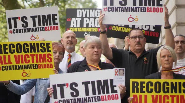 Campaigners, including many who have been personally infected or affected by the infected blood scandal, protest in Westminster