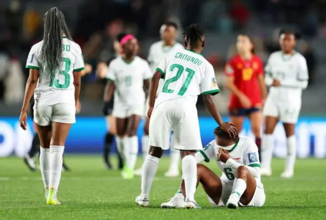 Zambian players after loss against Spain