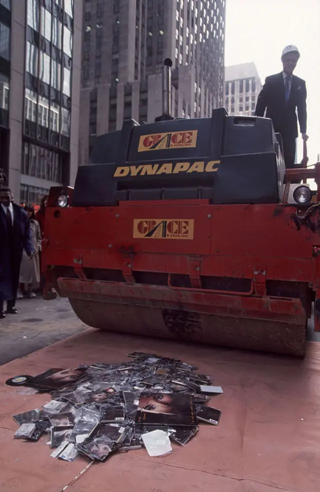 A steam roller destroys albums by Sinead O'Conner, New York, New York, October 25, 1992. This was done in the wake of her performance on 'Saturday Night Live' where she tore a photograph of Pope John Paul in protest of child sexual abuse.