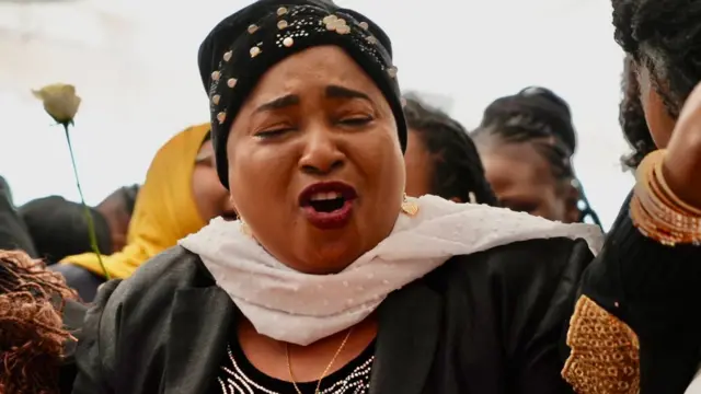 A mourner at a vigil in Nairobi, Kenya