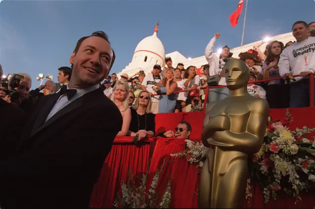 Kevin Spacey pictured attending the 2000 Oscars ceremony in Los Angeles