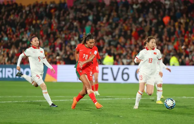 Nazare shoots towards goal for Portugal.