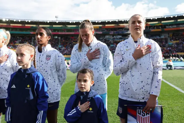 United States team sing  national anthem