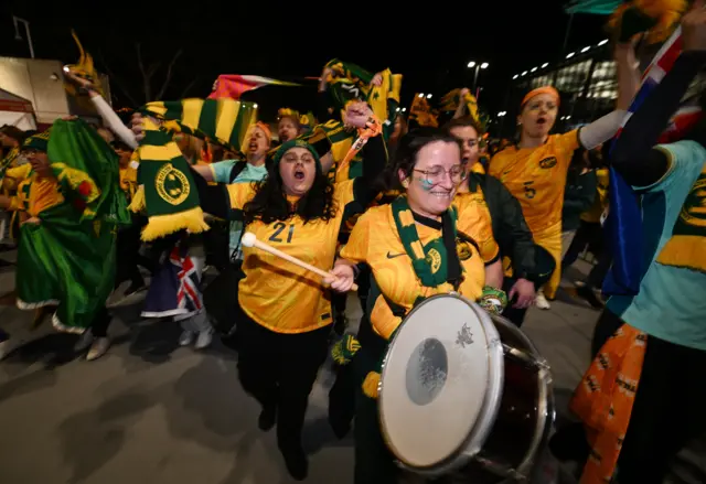 The Australia team band arrive with plenty of noise of a big drum at the ground.