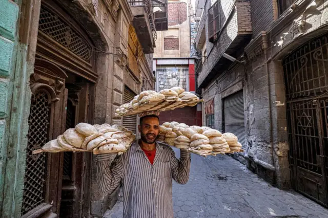 Man with fresh bread