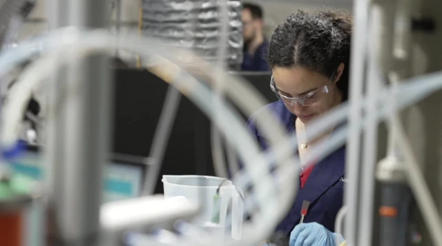 A scientist working on the project