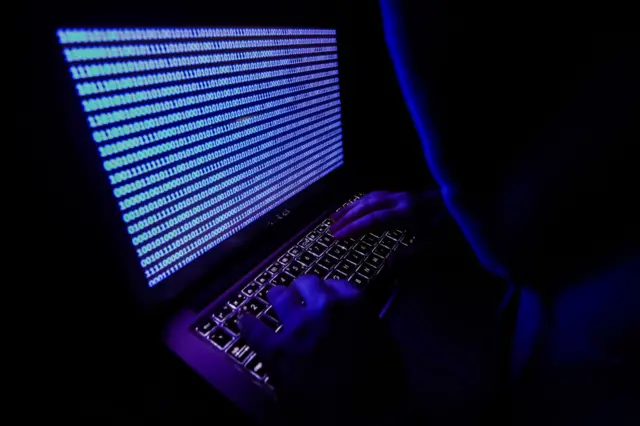 stock image of a hacker