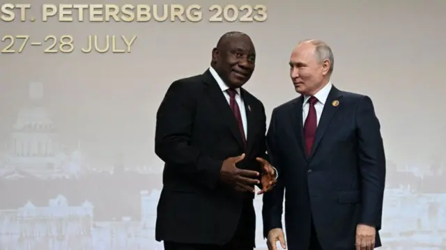 Russian President Vladimir Putin greeting South Africa's President Cyril Ramaphosa during a welcoming ceremony at the second Russia-Africa summit in Saint Petersburg - 27 July 2023