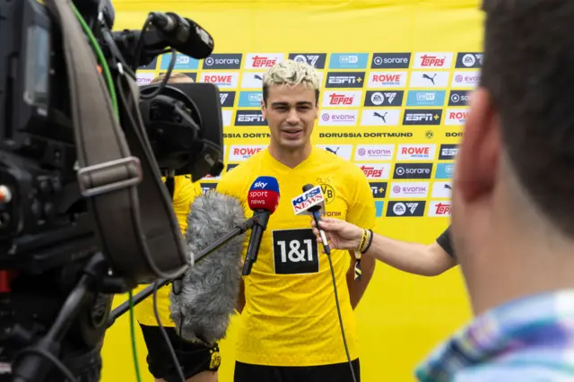 Gio Reyna being interviewed at a Borussia Dortmund training sessions