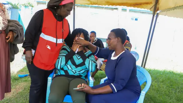 The relative of a victim of a traffic accident breaks down at Londiani Sub-County Hospital in Londiani Junction area along the Kericho-Nakuru highway in Kericho county, Kenya's Rift Valley region, Kenya, 01 July 2023