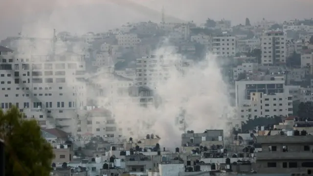 Smoke rises during an Israeli military operation in Jenin