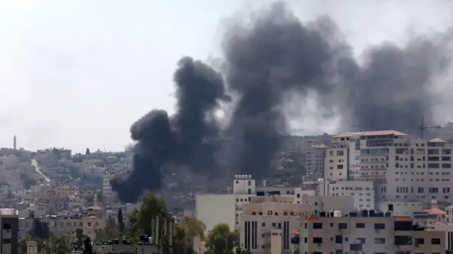 Smoke rises over the Jenin refugee camp