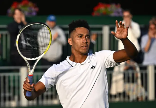 Michael Mmoh of the U.S. celebrates after winning his first round match against Canada's Felix Auger Aliassime