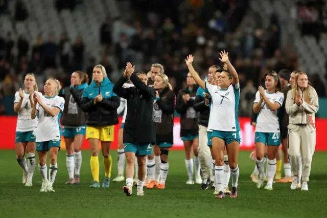 New Zealand players thank the fans at full time.