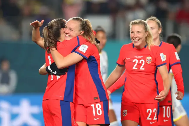 Norway celebrate their goal.