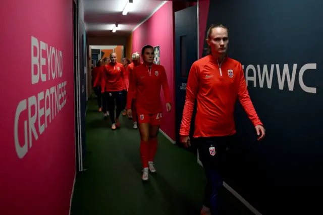 Caroline Graham Hansen walks through the tunnel to the pitch.