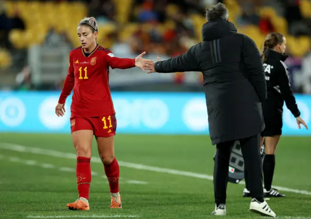 Putellas high fives Vilda after being substituted.