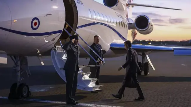 Rishi Sunak boarding a plane