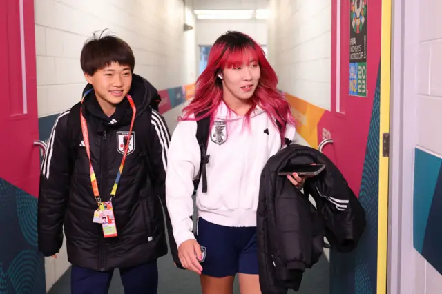 Japan players arrive at the stadium.