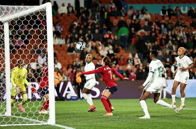 Herrera diverts the ball into the net for Costa Rica.