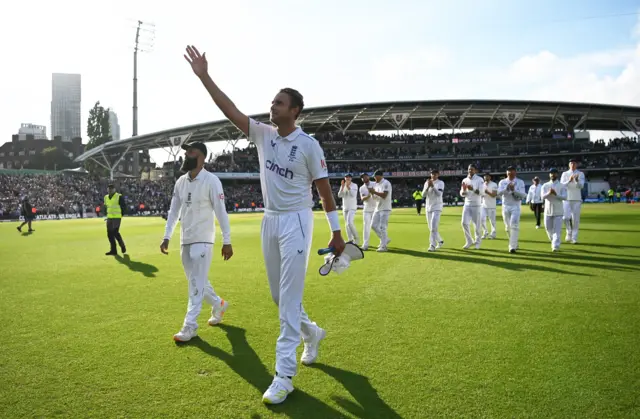 Stuart Broad waves to family as he walks off