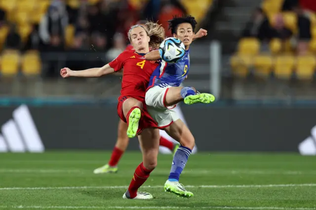 Ueki and Parades battle for the ball.